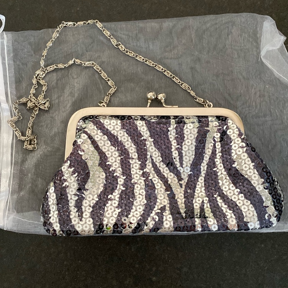 Gorgeous, black and silver sequin clutch with chain